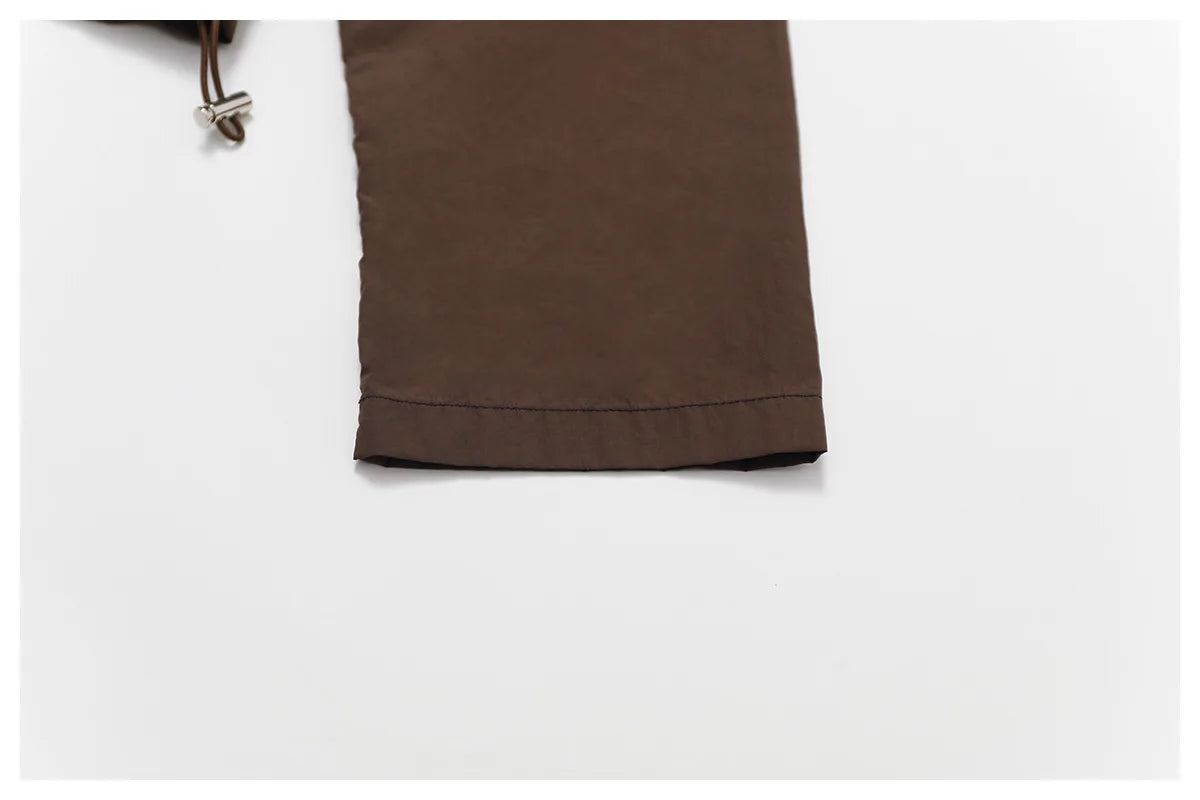 Kardigan damski z długimi rękawami i kapturem, zapinany na zamek