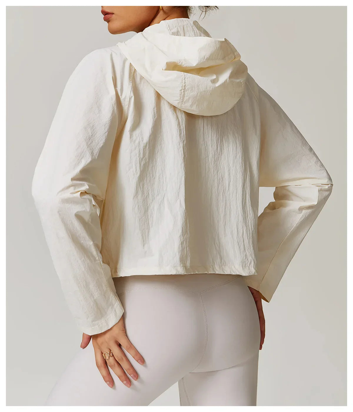 Kardigan damski z długimi rękawami i kapturem, zapinany na zamek