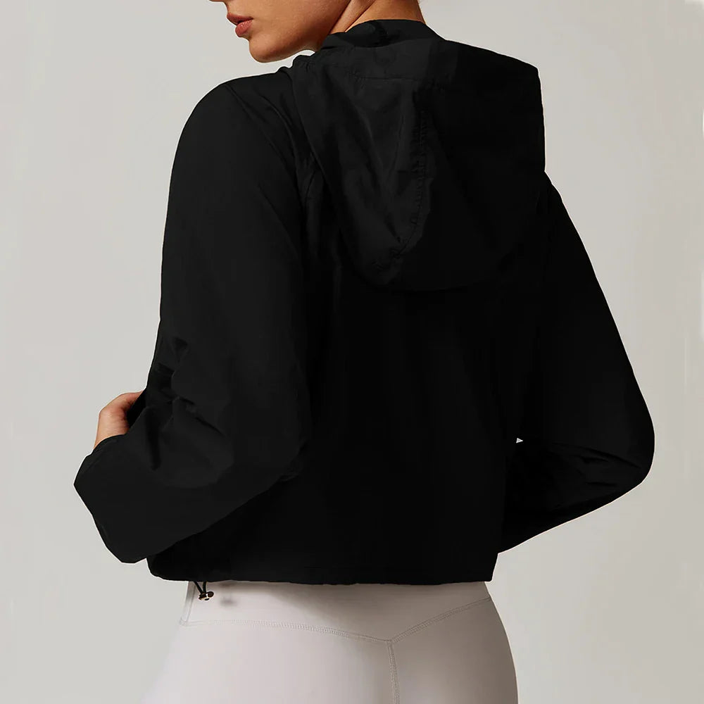 Kardigan damski z długimi rękawami i kapturem, zapinany na zamek