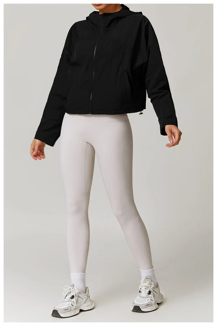 Kardigan damski z długimi rękawami i kapturem, zapinany na zamek