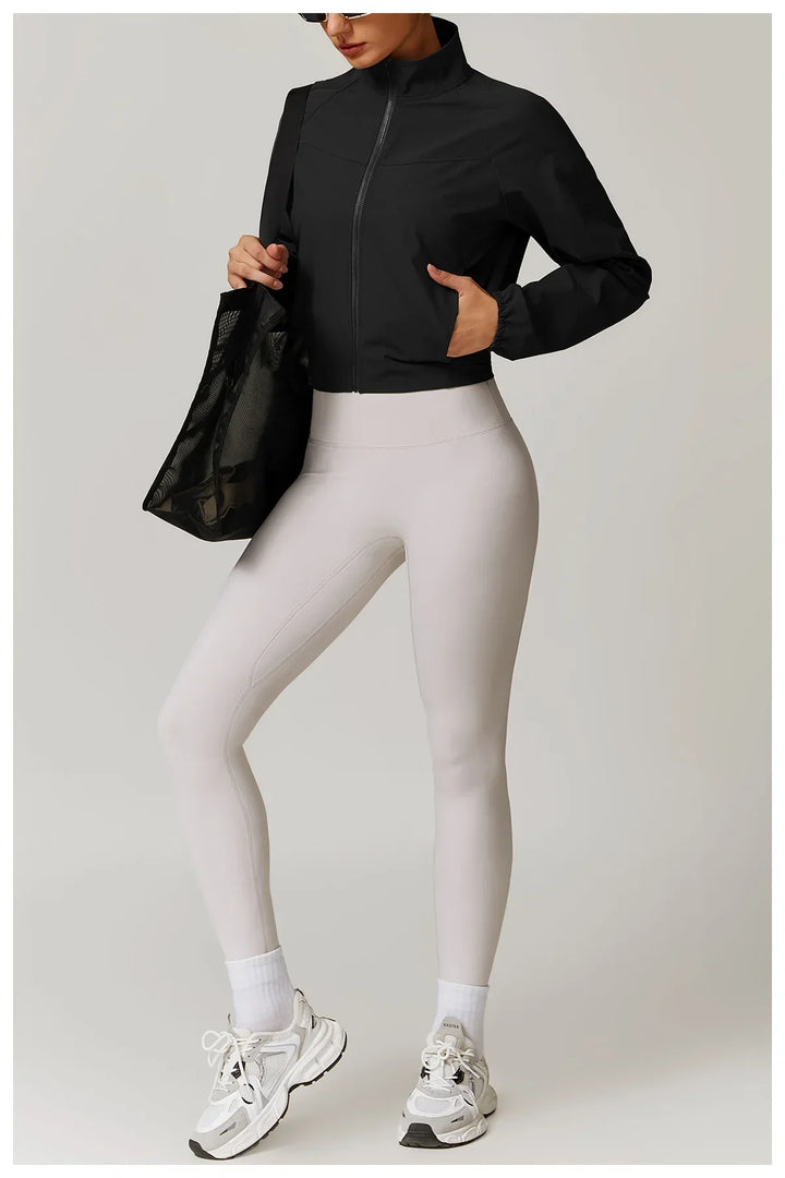 Damska kurtka do fitnessu z długim rękawem na zewnątrz