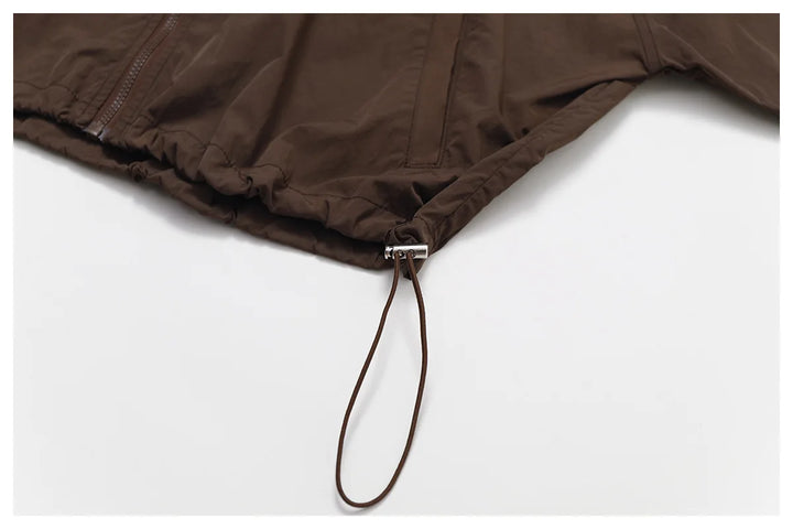 Kardigan damski z długimi rękawami i kapturem, zapinany na zamek