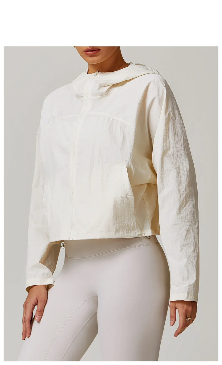 Kardigan damski z długimi rękawami i kapturem, zapinany na zamek