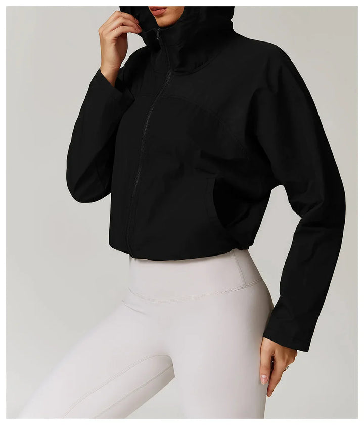 Kardigan damski z długimi rękawami i kapturem, zapinany na zamek