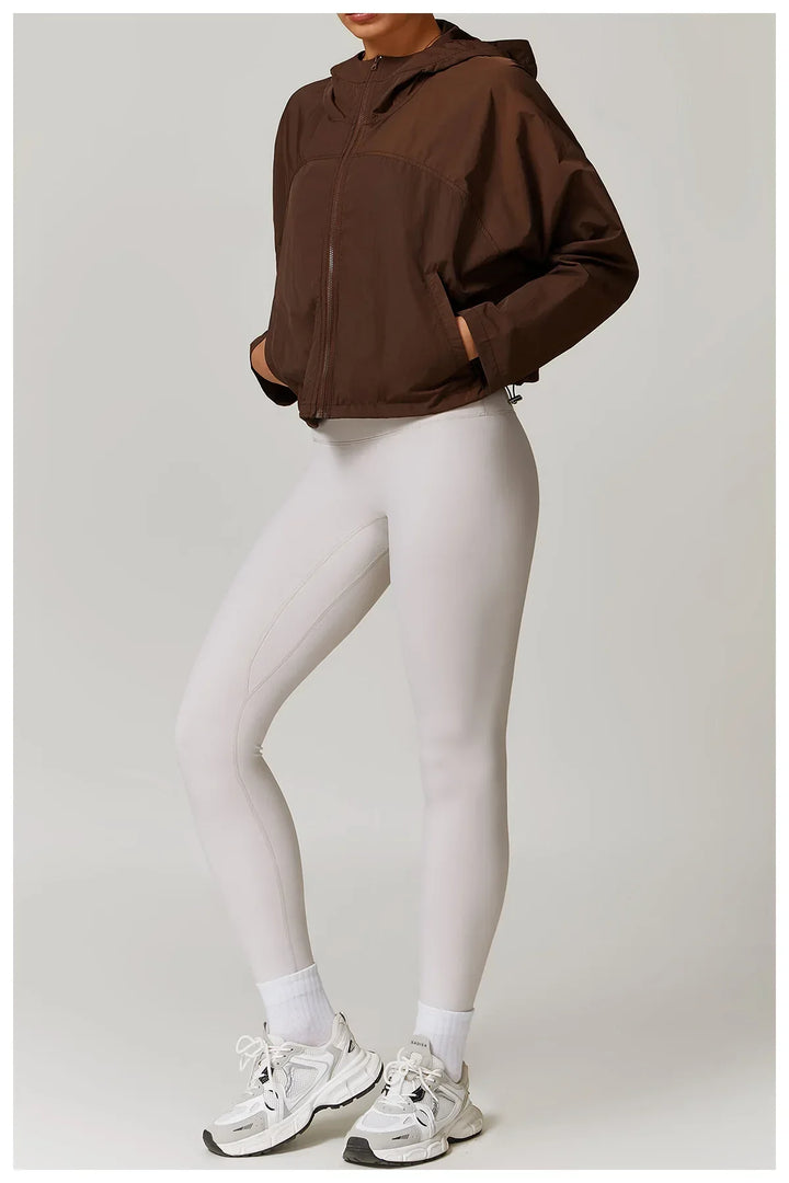 Kardigan damski z długimi rękawami i kapturem, zapinany na zamek