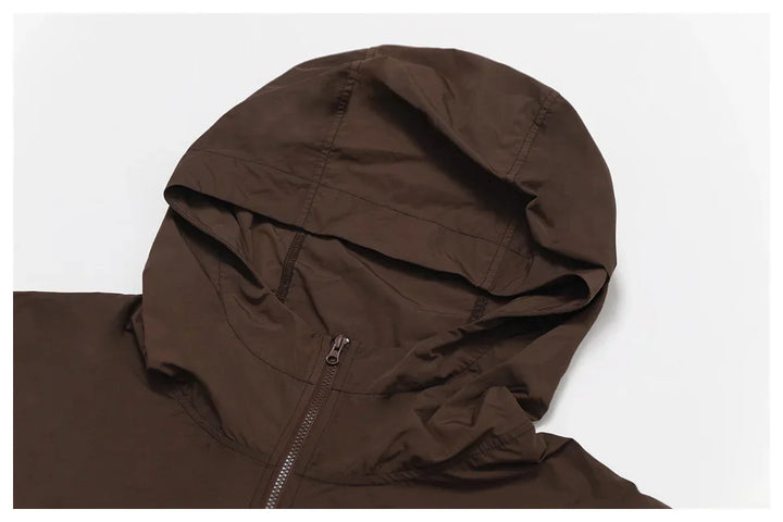 Kardigan damski z długimi rękawami i kapturem, zapinany na zamek